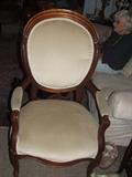 This large Victorian gentleman's chair upholstered in off white will go with anything anywhere. It's 150 years old, $150. The owner is only 101 she will go to California. 