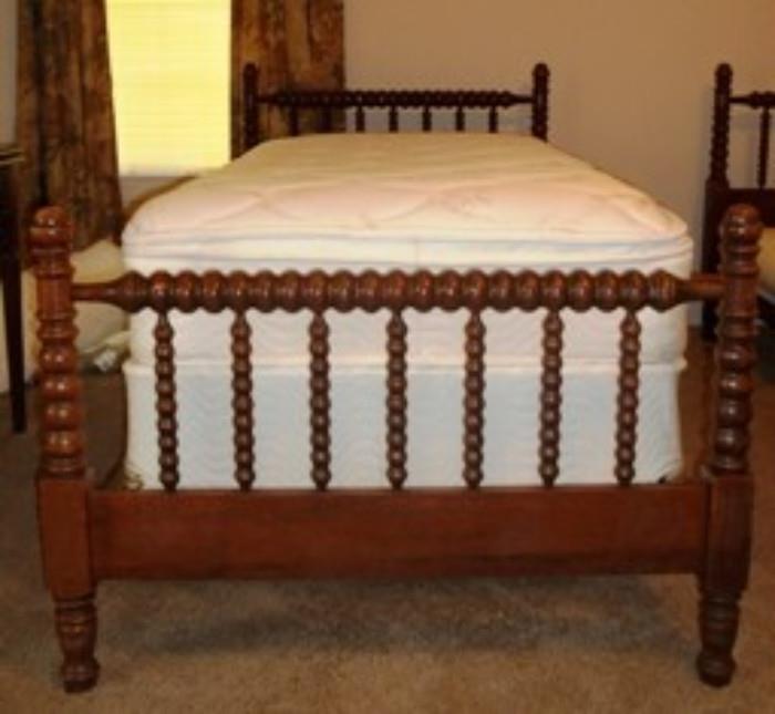 One of two twin beds