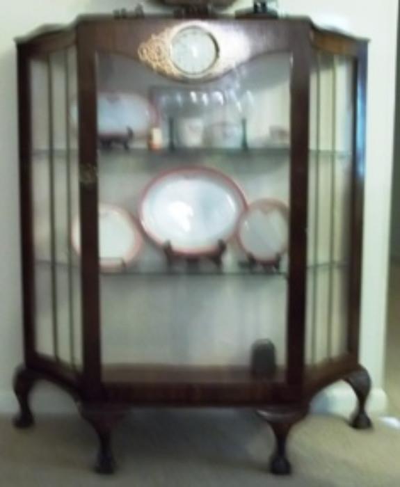 China cabinet with Rose G.M.& O. railroad train dishes