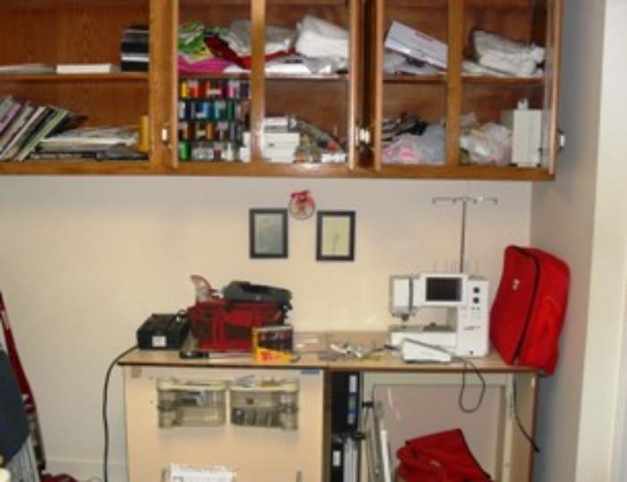 Cabinet with Bernina 200 sewing and embroidery machine and accessories