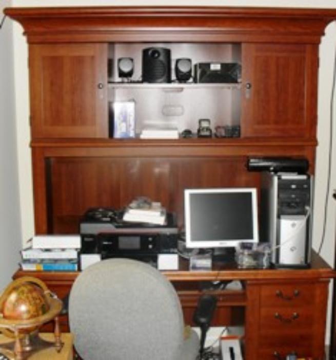 Computer station with computer, chair, etc.