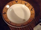 Front of Warren Kimble dishes 8 PC place setting