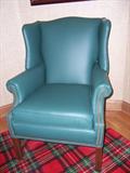2 Green Leather Wing Chairs