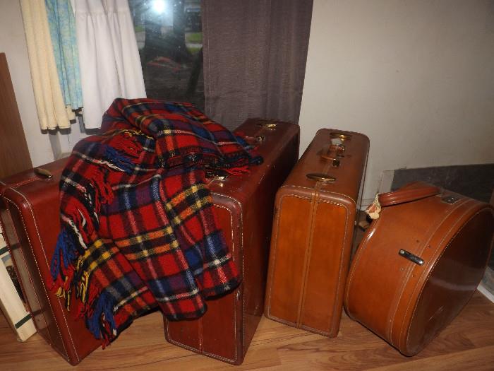 Vintage suitcases (train case full of wooden spools to be offered separately).
