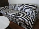 Three cushion sofa with striped upholstery