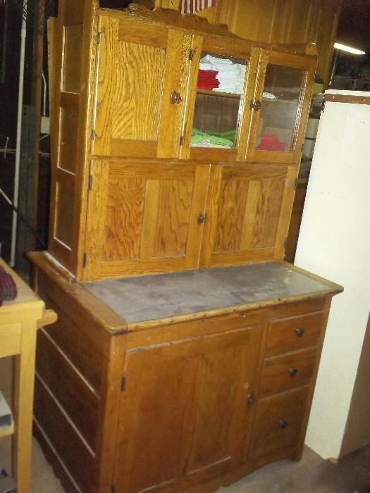 Hoosier cabinet with flour sifter