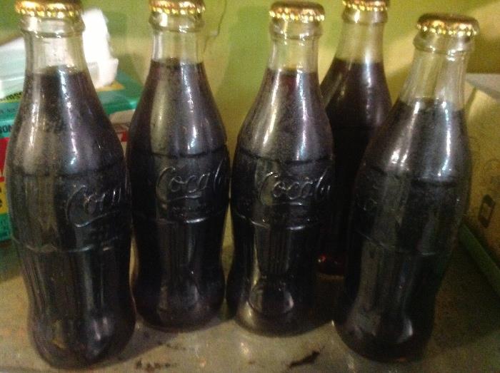 Unopened original coke bottles