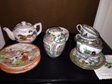 ASIAN TEACUPS AND TEAPOT