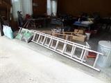 two extension ladders - two step ladders and othere step stools and etc.