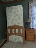 blond twin bed and night stand 