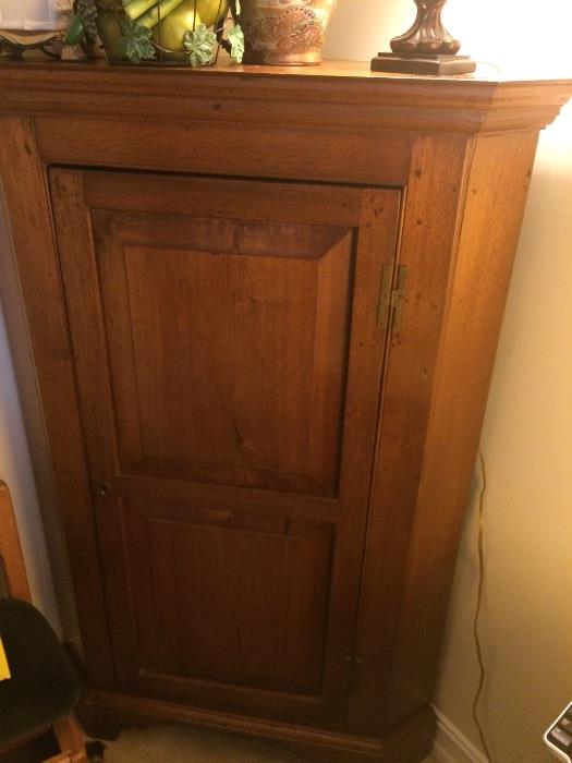 Antique corner storage cabinet
