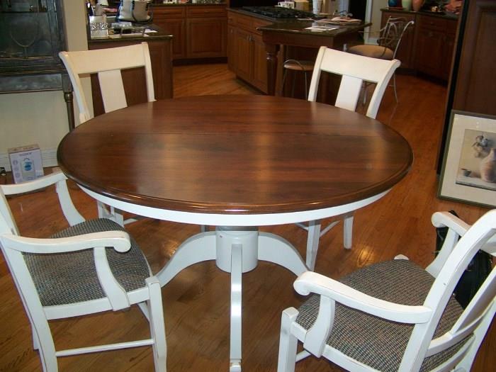 Beautiful Dark Wood-Cherry with white accent pedestal Table and four chairs