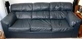 This Navy Leather Sofa has a comfy matching chair, perfect for a den or office.