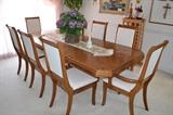Solid Oak Dining Table, newly upholstered, by Arcese Bros.