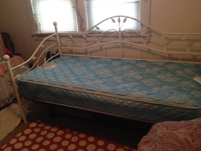 Twin-sized metal daybed.