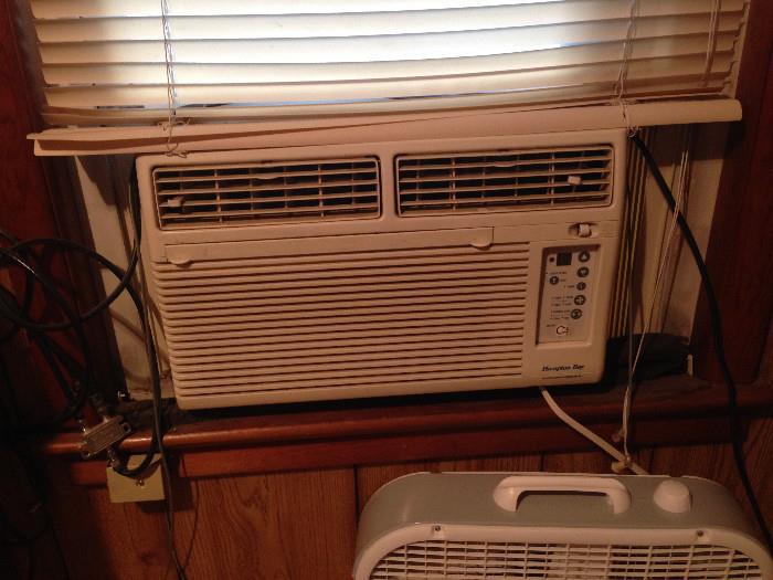 One of two window air conditioners, works.