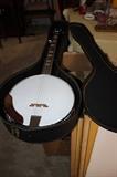 New banjo never used in case.