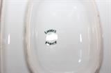 Limoges stamp on bottom of dinner service.