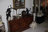 Selection of clocks, antique scales, two elephants, faux bronze statues.