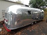 Vintage Airstream trailer; exterior in very good conditon. Inside is empty and ready for restoration.