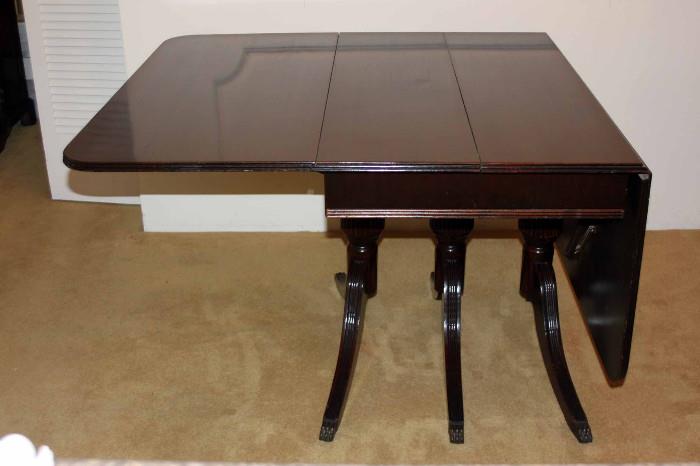 Highly versatile table. Having both sides up extends the table to approximately 63".
