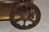 Ornate back wheels of the Tea Cart.