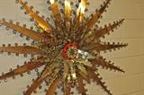 Tin wall hanging-approximately 41" diameter.