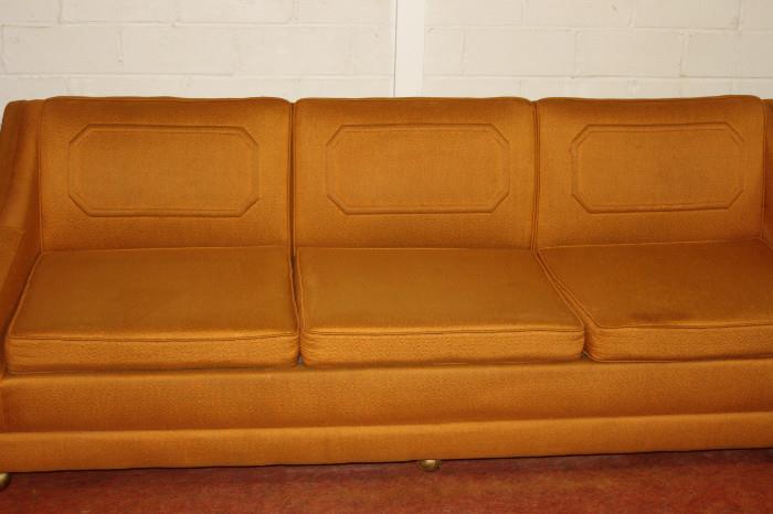 Mid-century style sofa. Approximate measurements are 82"L x 33"W. 