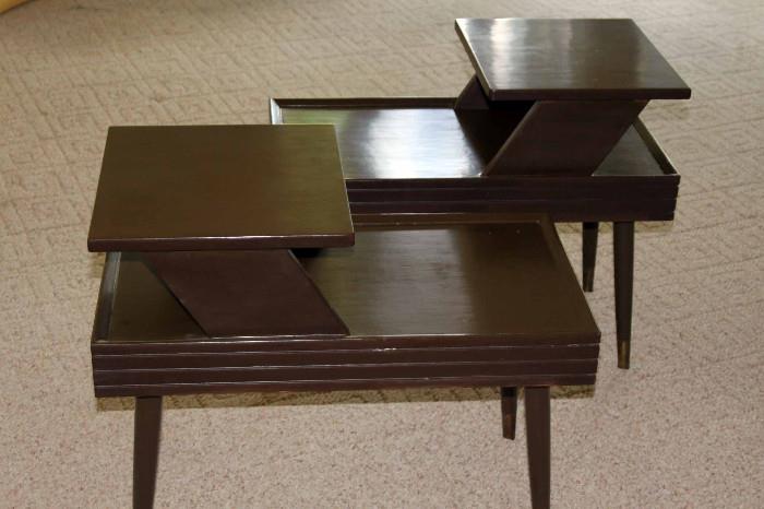 Matching end tables with approximate dimensions of 28"L x 15"W x 23"H. There is also a coffee table to complete the set.