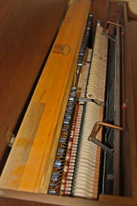 Inside the American Craftsman Piano, a little tuning is needed.