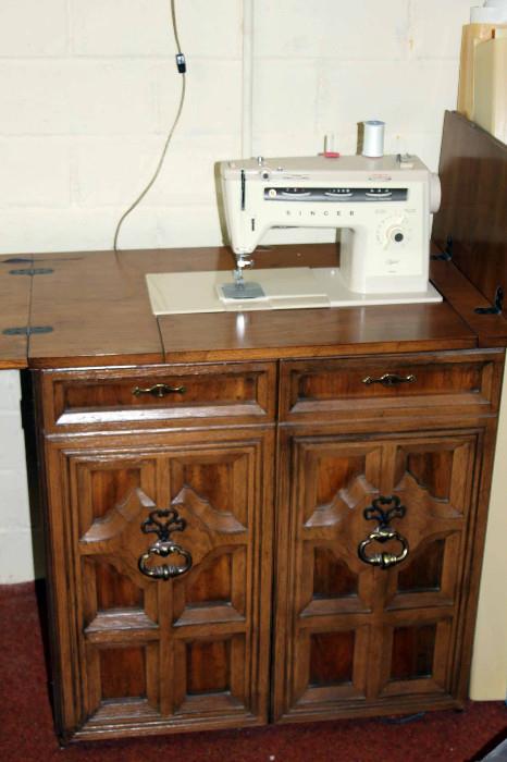 Singer Sewing Machine and console.