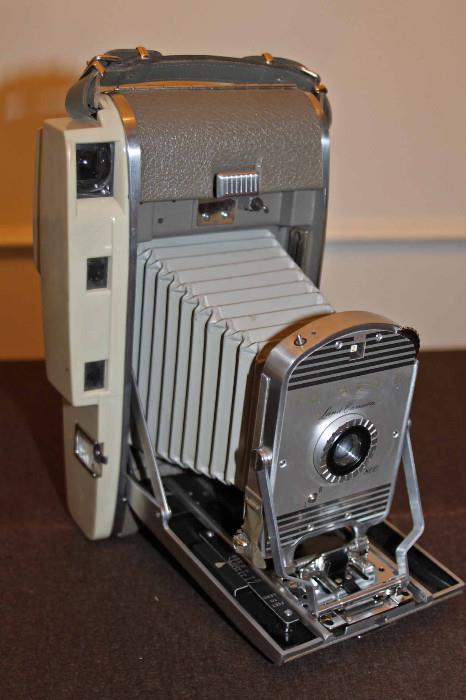 Polaroid Land Camera, Model 150 and the 800. Opened view.