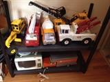 Multiple Old Tonka trucks and Nylint trucks