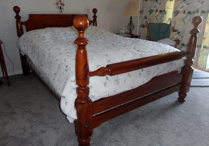 Beautiful bedroom set includes queen sized bed, chest of drawers, bedside table and dresser with mirror.