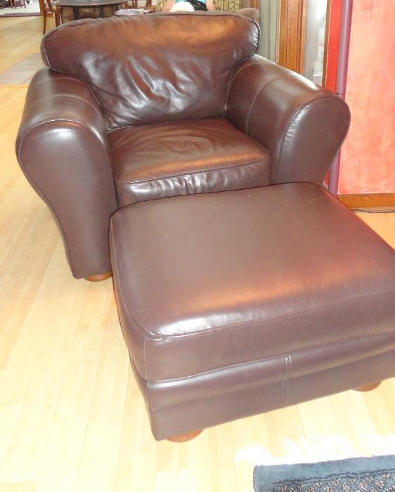 Palliser leather armchair with matching ottoman.