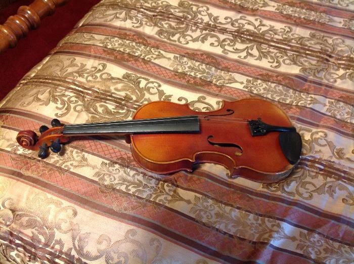 Reproduction of Stradivarius violin, with bow and case