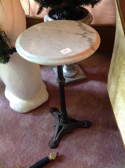 Cast iron, marble top table