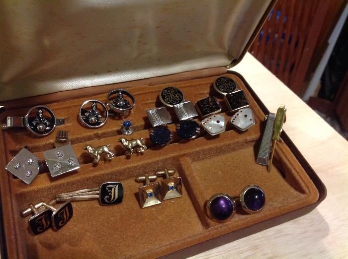 Box of cuff links, some sterling