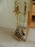 Brass and wood fireplace set