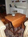 Stickly drop leaf table with center drawer