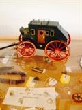 small wood reproduction of stage coach.