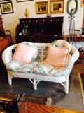 White wicker loveseat in new condition