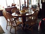Excellent light oak table with 6 chairs and a leaf, claw feet only $250!!!