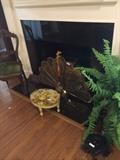 Antique chair and fan fire screen