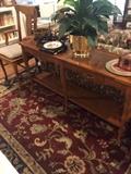 Sofa table; large rug; antique chair