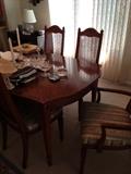 Dining room with 6 chairs, 3 leaves and cover.  Excellent condition