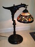 Tiffany style table lamp with raised scarab art glass design