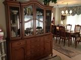 China cabinet matches table with 6 chairs