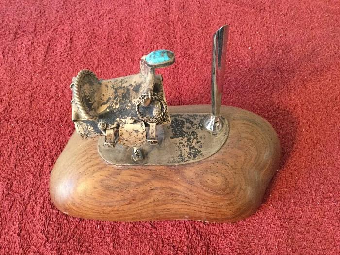 STERLING SILVER PEN HOLDER WITH EMBELLISHED STERLING & TURQUOISE SADDLE MOUNTED ON WOOD