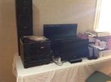 stereo system by Magnavox and four small flatscreen tvs by Insignia, Samsung, Sanyo and Toshiba. We also have a nice selection of records